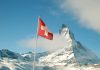 Commentaire : La Confédération suisse restera un État capitaliste qui blanchit son image et, si nécessaire, se débarrasse de son hypocrisie institutionnalisée comme d’un masque